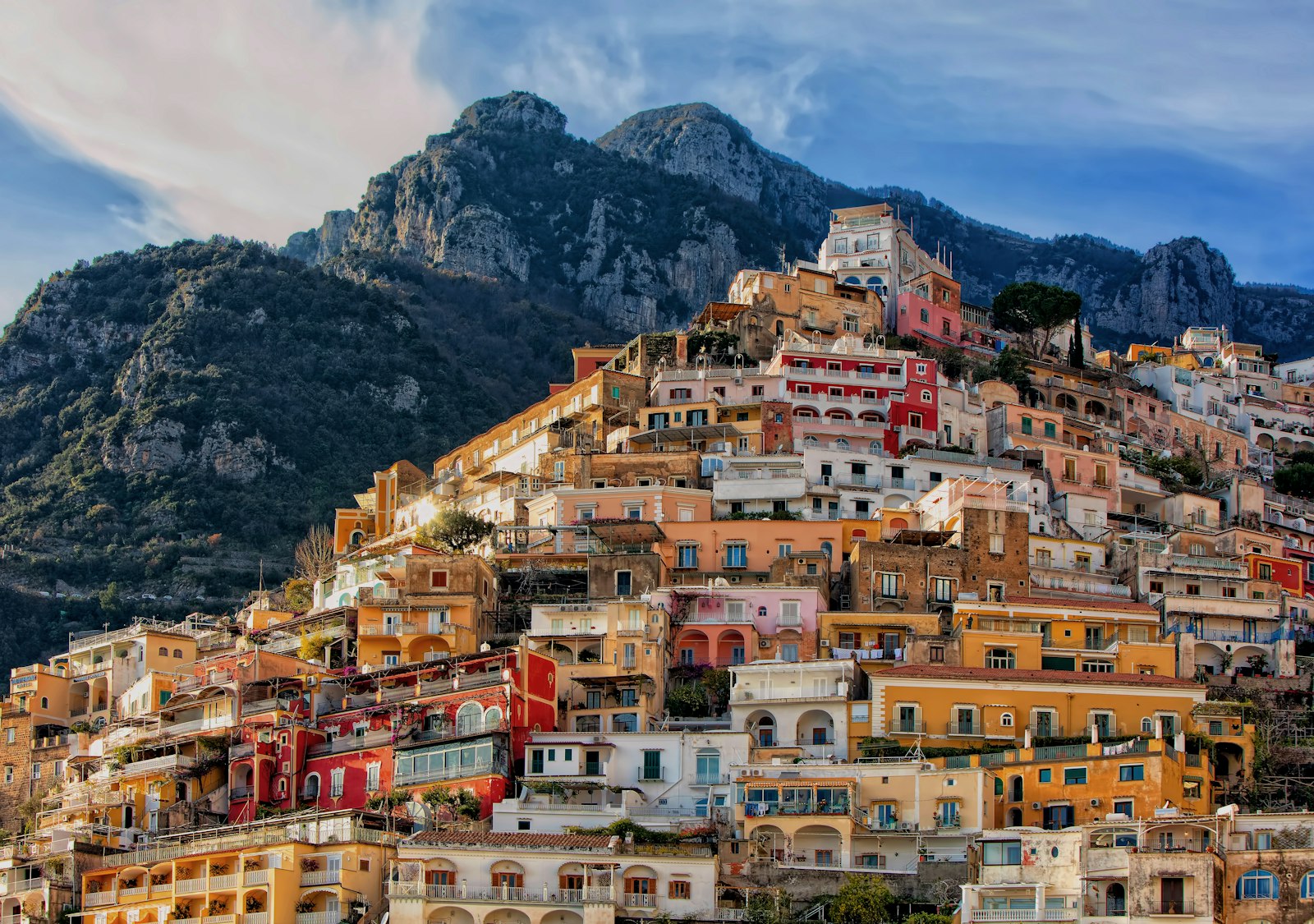 Positano stacked up the hillside in the afternoon sun